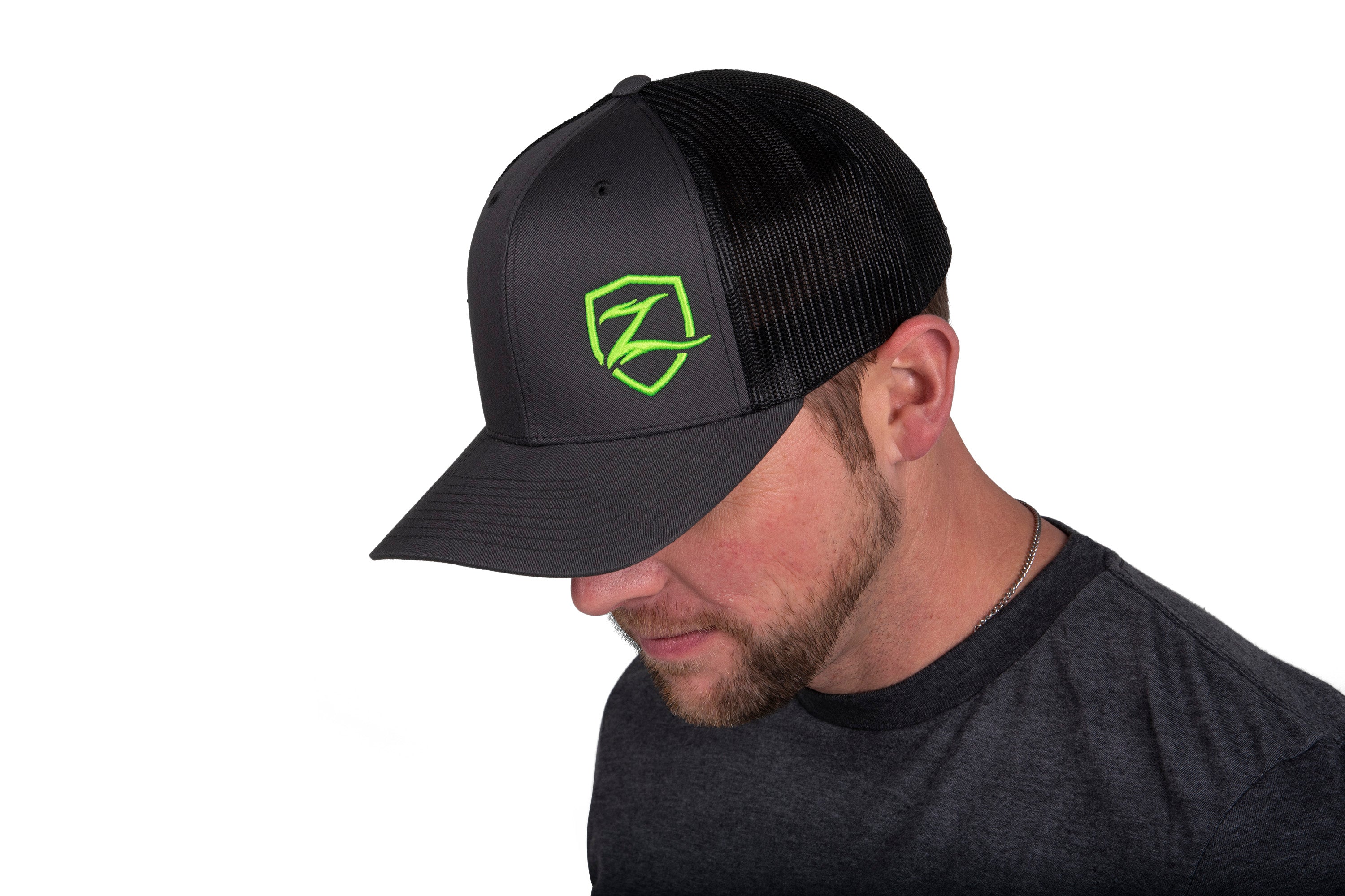 https://serenity-foxfactory.asset.akeneo.cloud/fox_asset_family/media/zone_u9137_trucker_hat_charcoal_gray_rotation_4.jpg